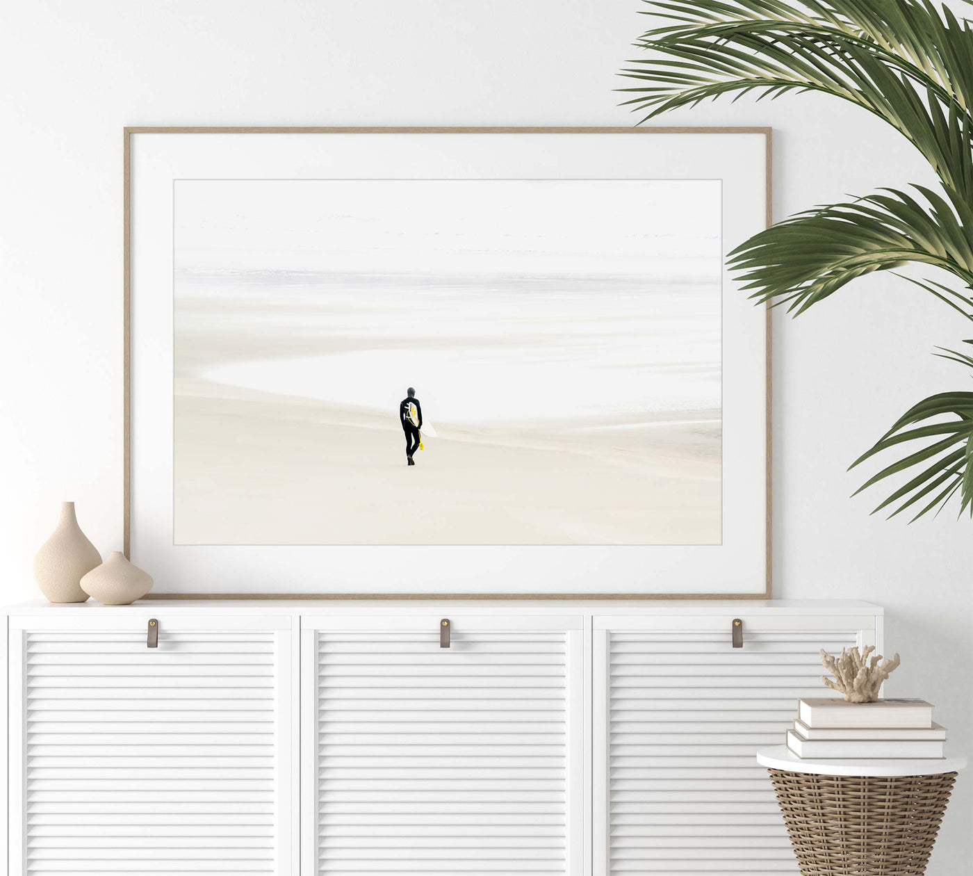 Surfer wall art by Cattie Coyle Photography above dresser