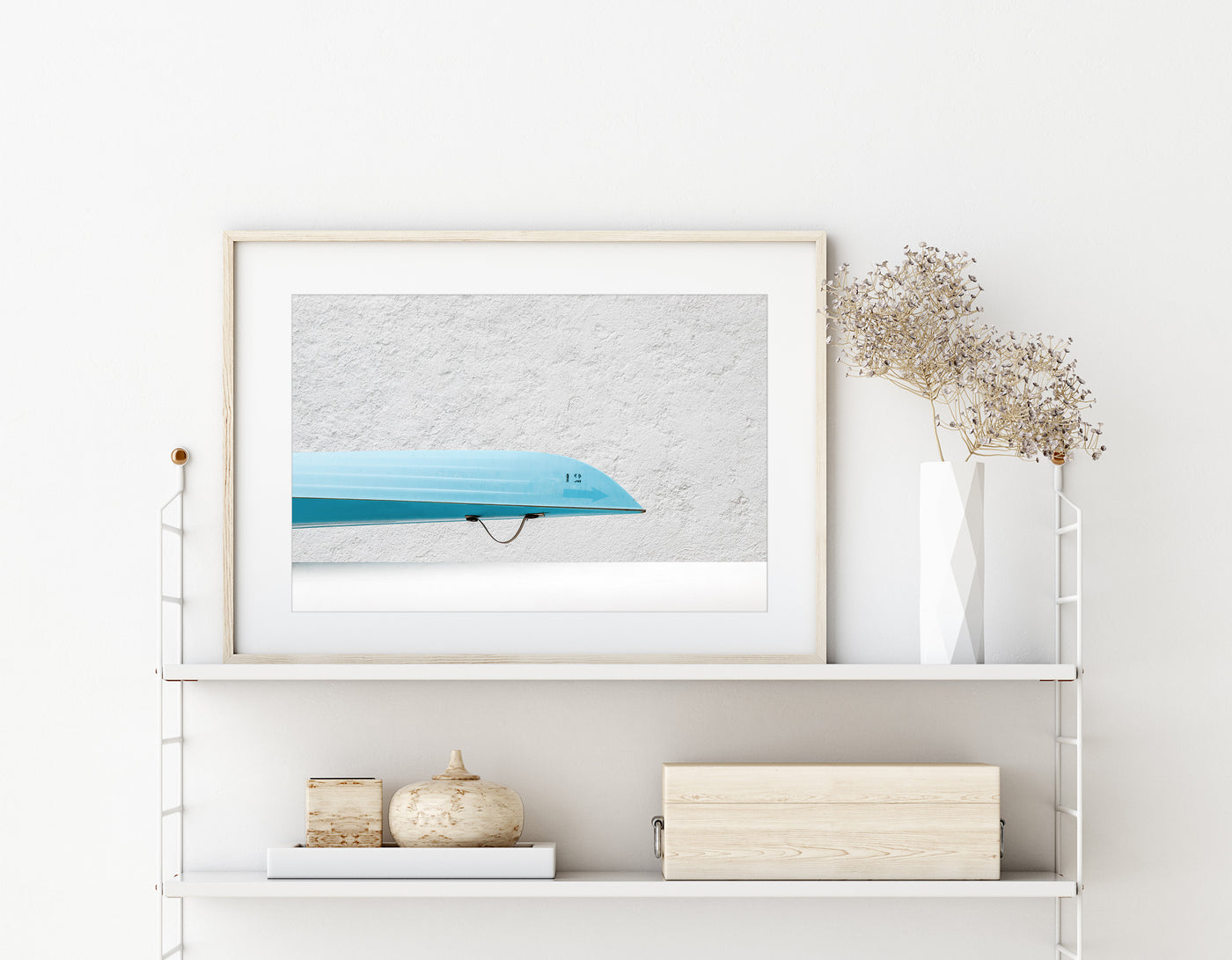 Rowing boat art print by Cattie Coyle Photography on shelf