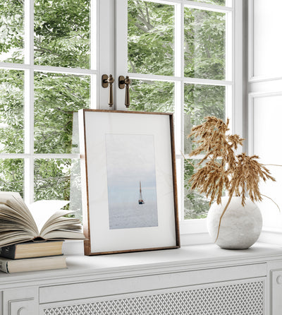 Nautical art print by Cattie Coyle Photography on windowsill