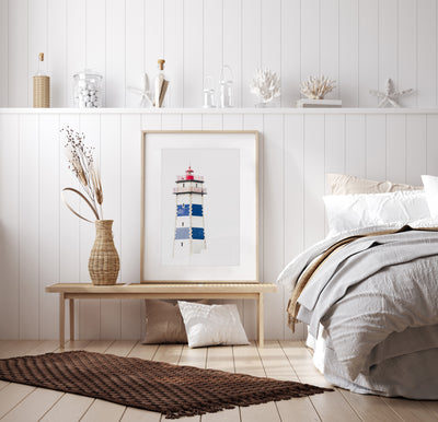 Lighthouse print by Cattie Coyle Photography in beach house bedroom